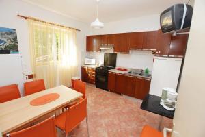 Kuchyň nebo kuchyňský kout v ubytování Apartments Dubravka