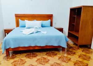 Postel nebo postele na pokoji v ubytování HOTEL EDELMIRA