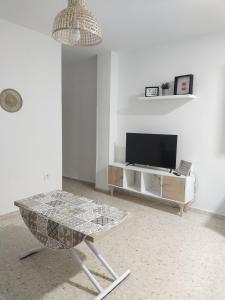 TV a/nebo společenská místnost v ubytování Mima