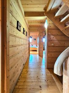 Posteľ alebo postele v izbe v ubytovaní Góralski Dom - Widokowa Osada Gawlaki Zakopane - Loft Affair