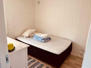 Säng eller sängar i ett rum på Familjärt i Sundänge