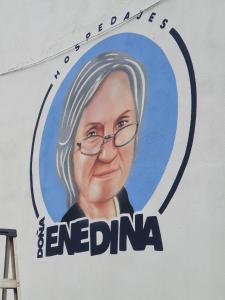 a sign with a picture of an older woman at HOSPEDAJE DOÑA ENEDINA in Ciudad Acuña