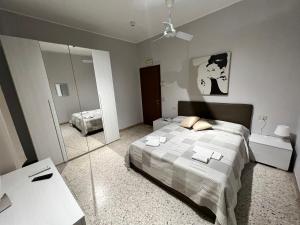 Postel nebo postele na pokoji v ubytování Hotel Sabatino