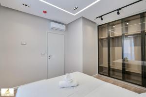 Postel nebo postele na pokoji v ubytování Norge Hotel