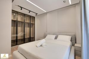 Postel nebo postele na pokoji v ubytování Norge Hotel