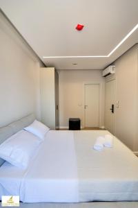 Postel nebo postele na pokoji v ubytování Norge Hotel