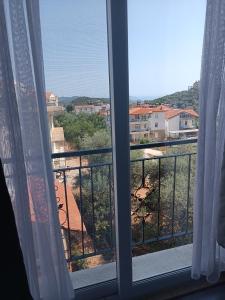 a window with a view of a city at Ada suit in Kas