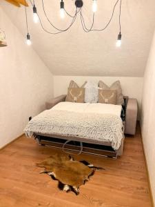 מיטה או מיטות בחדר ב-Chalet Black Deer
