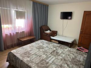 Postel nebo postele na pokoji v ubytování Casa Vio parter