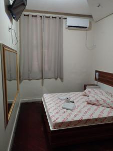 Katil atau katil-katil dalam bilik di Hotel Santos