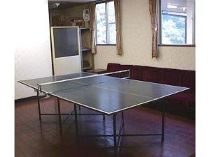 a ping pong table in the middle of a room at Business hotel Green Plaza - Vacation STAY 43971v in Chikuma