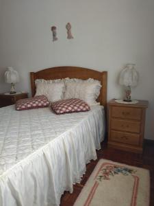 Ένα ή περισσότερα κρεβάτια σε δωμάτιο στο Couto Sá