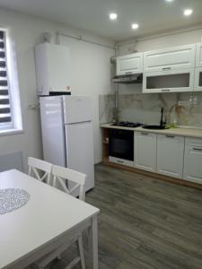 Η κουζίνα ή μικρή κουζίνα στο New Apartment