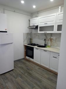 Η κουζίνα ή μικρή κουζίνα στο New Apartment