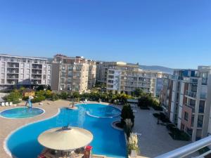 a view from a balcony of two swimming pools at Sun City 1 - Family Apart Complex in Sunny Beach