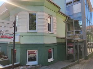 a building on the side of a street at ApartmanyHurbanova1 in Bardejov