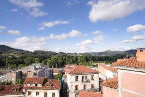 a view from the roofs of a town at 10A02 Precioso apartamento Pravia in Pravia