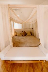 Ein Bett oder Betten in einem Zimmer der Unterkunft The Babe Villa