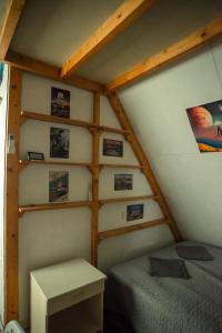 A bed or beds in a room at Centro Apartman