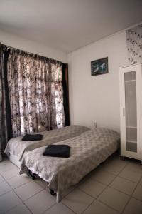 Posteľ alebo postele v izbe v ubytovaní C2 apartman