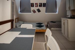 Posteľ alebo postele v izbe v ubytovaní C2 apartman