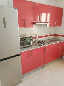 Kuchyň nebo kuchyňský kout v ubytování Appartement Yasmine