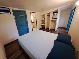 Postel nebo postele na pokoji v ubytování Baconao apartment 1 room + 1 fotografie