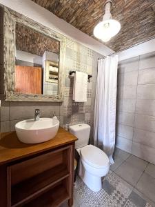 Tango Suites tesisinde bir banyo