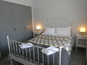 Ένα ή περισσότερα κρεβάτια σε δωμάτιο στο Casa do Cabedelo +35 φωτογραφίες