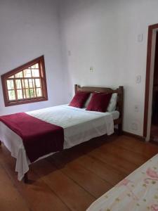 Postel nebo postele na pokoji v ubytování Villa dos Pássaros Paraty Hospedagem