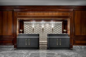 a lobby with wood paneling and a wall at The Ritz-Carlton, Tysons Corner in Tysons Corner