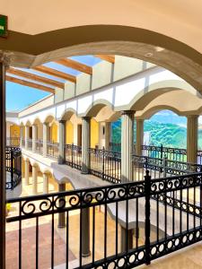 a view from the balcony of a building with an archway at Real Cocula in Cocula