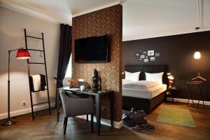 Postel nebo postele na pokoji v ubytování Syte Boutique Hotel Mannheim