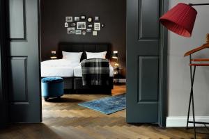 Postel nebo postele na pokoji v ubytování Syte Boutique Hotel Mannheim