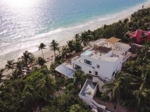 an aerial view of a house on the beach at Chiringuito Tulum in Tulum
