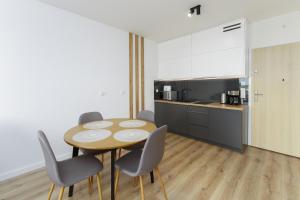 Kuchyň nebo kuchyňský kout v ubytování Apartament Morski Navigator by HolidaySun