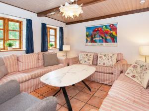 Гостиная зона в 14 person holiday home in rsted