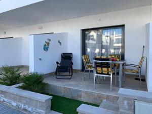 Posezení v ubytování Hermoso estudio en Pilar de la Horadada