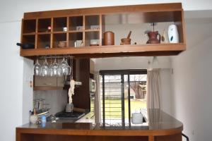 a kitchen with a counter top in a room at Refugio Andino in Malargüe