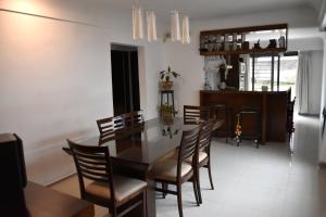 a dining room with a table and chairs at Refugio Andino in Malargüe
