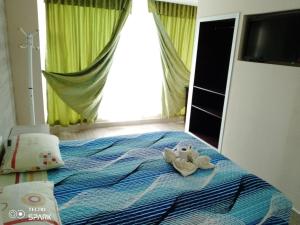Letto o letti in una camera di HOSPEDAJE YACUCALLE