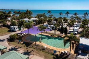 an aerial view of a pool at a resort at NRMA Bowen Beachfront Holiday Park in Bowen