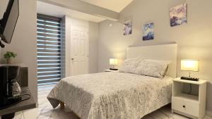 Un pat sau paturi într-o cameră la Habitacion Plata# 1