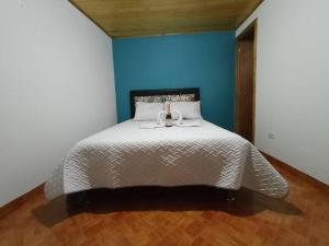 Letto o letti in una camera di Guaxique