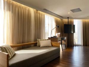 Ένα ή περισσότερα κρεβάτια σε δωμάτιο στο Just Sleep Hualien ZhongZheng