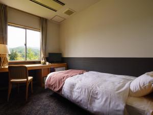 Cama o camas de una habitación en Hotel Seifuuen
