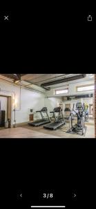 a gym with several exercise bikes in a room at Stunning 2 bedroom Downtown Ft Worth in Fort Worth