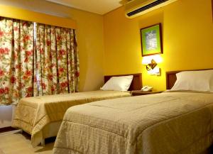 Cama ou camas em um quarto em Hotel Bristol Asuncion