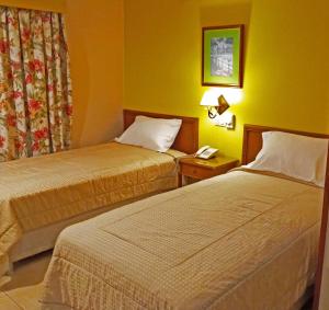 Cama ou camas em um quarto em Hotel Bristol Asuncion