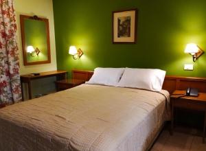 Cama ou camas em um quarto em Hotel Bristol Asuncion